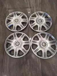 THESE ARE WHEEL COVERS NOT RIMS          BRAND NEW   MAZDA  REPLICA 16 INCH WHEEL COVER SET OF FOUR.