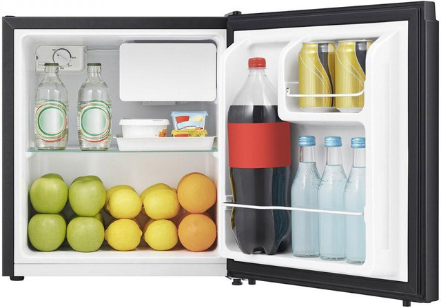A compact place to store your snacks! Hisense 1.6 Cubic Feet Mini Fridge in Refrigerators - Image 4