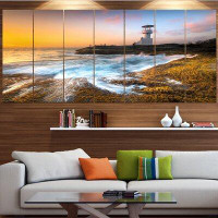 Design Art 'Lighthouse on Beautiful Seashore' Photographic Print Multi-Piece Image on Canvas
