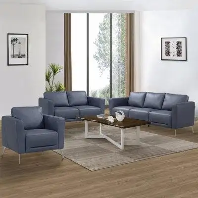 Upholstered in beautiful serene blue leather that will blend seamlessly with various decor styles an...
