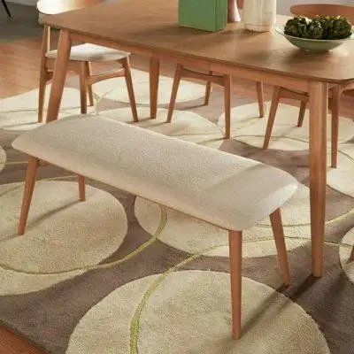 Add this stylish and functional dining bench to your dining room or eat-in kitchen! Taking cues from...