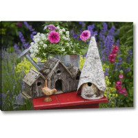 August Grove Bird Houses And Planter On Garden Table by Don Paulson - Photograph Print on Canvas
