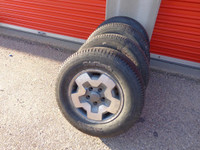 4 Total Terrain All Season Tires on Chevrolet Rims 5 Bolt 4 and 5/8 Inches * P235 70R15 102S * $200.00 for 4