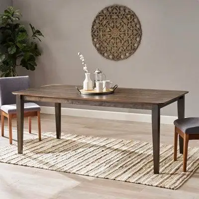 FARMHOUSE DESIGN: Our dining table features an organic look paired with a slatted table top for a fa...