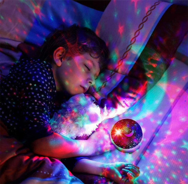 ILLUMINATING AND ROTATING NIGHT SKY PROJECTOR - Turn your room into a star-filled sky! Only $19.95! in Toys & Games