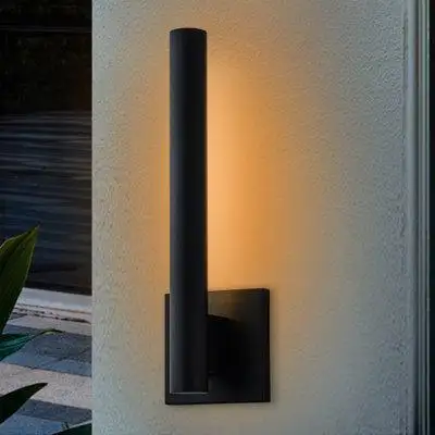 This sleek energy-efficient LED wall sconce is designed with a slim vertical silhouette that lifts o...