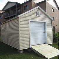 NEW IN STOCK! Brand new white 5 x 7 roll-up door great for shed or garage!