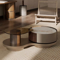 Brayden Studio Rotating Storage Coffee Table With Glass And Sintered Stone