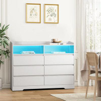 Ebern Designs Dresser with drawers and open storage for living room use