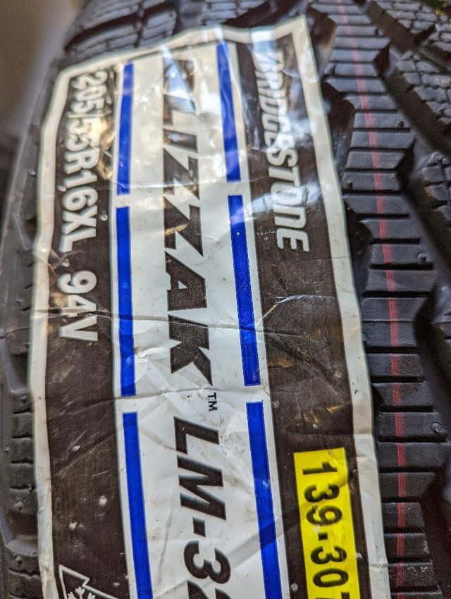 BRAND NEW WITH LABELS ULTRA HIGH PERFORMANCE  BRIDGESTONE   205 / 55 / 16  WINTER  TIRE     SET OF     FOUR. in Tires & Rims in Ontario - Image 4