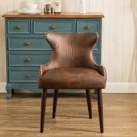 Charlton Home Tufted Button Back barrel chair with Nailhead