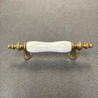 D. Lawless Hardware 3" Flare Foot Pull Brass With Wooden Insert