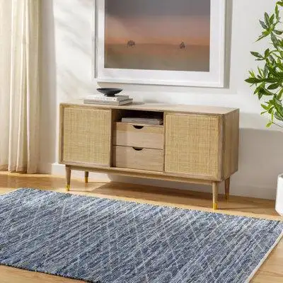 A simple yet compelling flatweave rug gives any room in your home a bold dynamic feel. This piece fe...