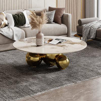 Everly Quinn Sevki 39.4" Round Coffee Table with sintered stone table-top