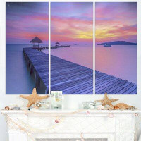Made in Canada - Design Art Long Wooden Bridge into the Sunset - 3 Piece Graphic Art on Wrapped Canvas Set