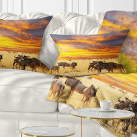 Made in Canada - East Urban Home African Antelope Crowd at Sunset Lumbar Pillow