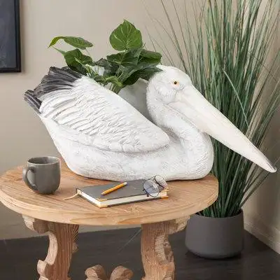 August Grove Cole And Grey 1 Piece Resin Textured Pelican Planter With Black Accents Set