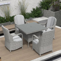 Wildon Home® Dustun 4 - Person Rectangular Outdoor Dining Set With Cushions