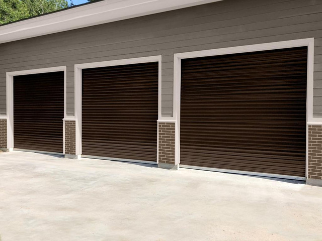 DISCOUNTED Bronze Roll-Up Doors, Over stock, Must Go! See sizes in ad. in Garage Doors & Openers in Alberta