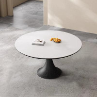 Corrigan Studio Nordic style simple matte rock plate round dining table.