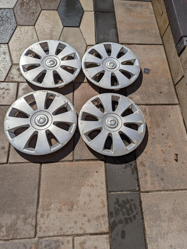 THESE ARE WHEEL COVERS NOT RIMS          SMART CAR   FACTORY OEM  USED 15 INCH WHEEL COVER SET OF FOUR. in Tires & Rims in Ontario