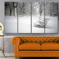 Design Art 'Benches in Park Covered with Snow' Photographic Print Multi-Piece Image on Canvas