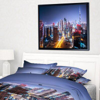 East Urban Home 'Fantastic Night Cityscape' Photograph on Canvas