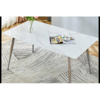 Wrought Studio Rectangular dining table with imitation marble tabletop and silver metal legs