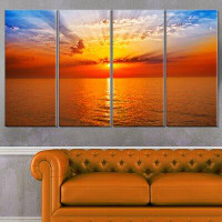 Made in Canada - Design Art 'Orange Sea Sunrise Under Blue Sky' Graphic Art Print Multi-Piece Image on Wrapped Canvas