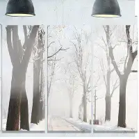 Made in Canada - Design Art 'Misty Rural Road in Winter Forest' Photograph Multi-Piece Image on Metal