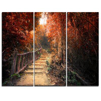 Design Art Stairway Through Red Fall Forest - 3 Piece Graphic Art on Wrapped Canvas Set