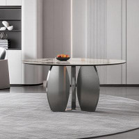 Orren Ellis Light luxury modern simple round rock plate dining table.