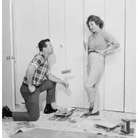Latitude Run® House Husband Painting Closet Door While Housewife Is Watching Poster Print (24 X 36)