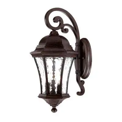 Ele vate your home's ambiance with this outdoor wall lantern. This traditional empire- shaped lanter...