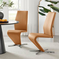 East Urban Home Wilhelm Faux Leather Chrome Feet 'Z' Leg Dining Chairs Modern Design