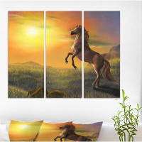 East Urban Home 'Rising Horse at Sunset' Graphic Art Print Multi-Piece Image on Wrapped Canvas