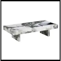 Ivy Bronx A modern and practical coffee table with black and white patterns