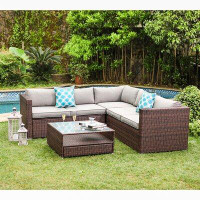 Wrought Studio Newagen 2 Piece Outdoor Furniture Set Sofa Cushions, Glass Coffee Table, 2 Teal Pillows Incl. Water Resis