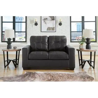 Everyday comfort meets versatile style in this loveseat. The handsome hue of the goes-with-anything...