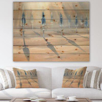 East Urban Home Sunny Sand With Closed Blue Beach Umbrellas - Lake House Print On Natural Pine Wood