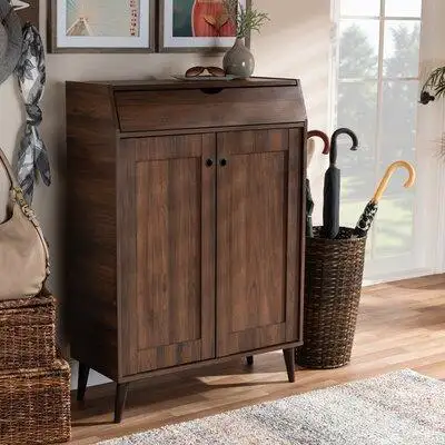 Retro style and ample storage make this 2-Door Wood Entryway 10 Pair Shoe Storage Cabinet a charming...