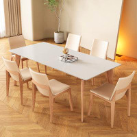 Corrigan Studio Nordic log wind rock board ash wood dining table and chair combination.