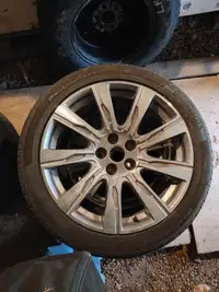 Cadillac XT4  factory wheels with new tires.  18 and 20