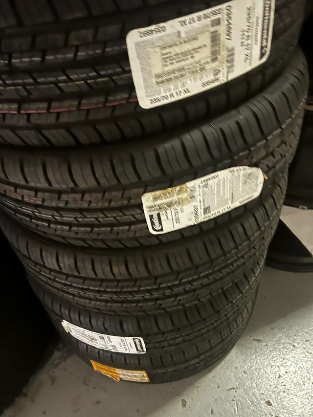 FOUR NEW 235 / 70 R17 CONTINENTAL 4X4 CONTACT TIRES !! in Tires & Rims in Toronto (GTA)