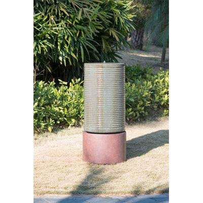 Latitude Run® Cylinder Ribbed Tower Water Fountain With Rustic Base, Outdoor Bird Feeder / Bath Cement Fountain in Outdoor Décor