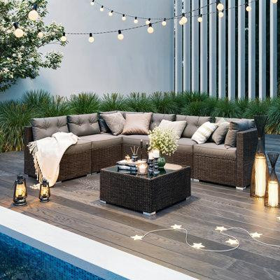 Ebern Designs Zechariah 107" Wide Outdoor Rectangle Patio Sectional Set with Cushions in Patio & Garden Furniture