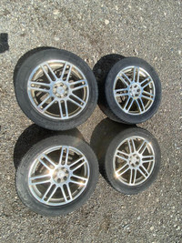 265/50R20 Set of 4 rims and tires that  come off from a 2007 CADILLAC SRX.
