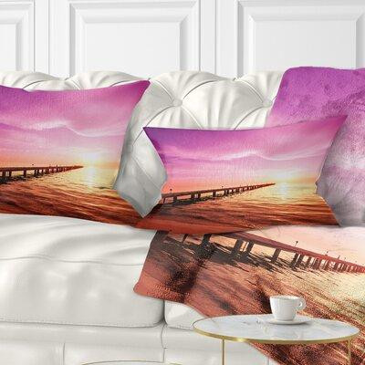 East Urban Home Bridge Sea and Pier Under Magenta Sky Lumbar Pillow in Bedding