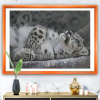 East Urban Home 'Snow Leopard Reclining' - Picture Frame Print on Canvas