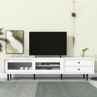 Ebern Designs Contemporary TV Stand Sliding Fluted Glass Doors, Slanted Drawers, and Ample Storage Space
